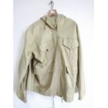 A reproduction Second World War British army tan smock