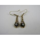 A pair of diamond and sapphire earrings
