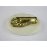 A Victorian brass and white marble paperweight