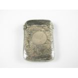 A silver vesta by William Neale engraved with floral scrolls and vacant cartouche