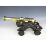 A quality cast brass and iron model of a cannon, barrel 38 cm