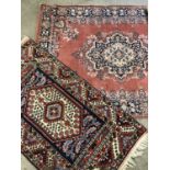 A small rug, 150 x 76 cm, together with one other