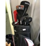 A Moto caddy golf bag with clubs
