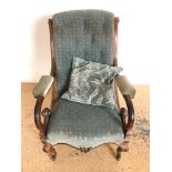 A Victorian upholstered mahogany easy chair