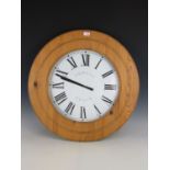 A large pine wall clock