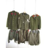 Six various European military tunics