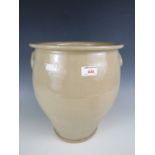 A large stoneware crock