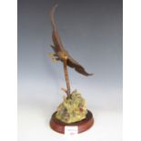 A Border Fine Arts figurine depicting a Flying Eagle A1277