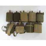 A quantity of British army water bottles and carriers