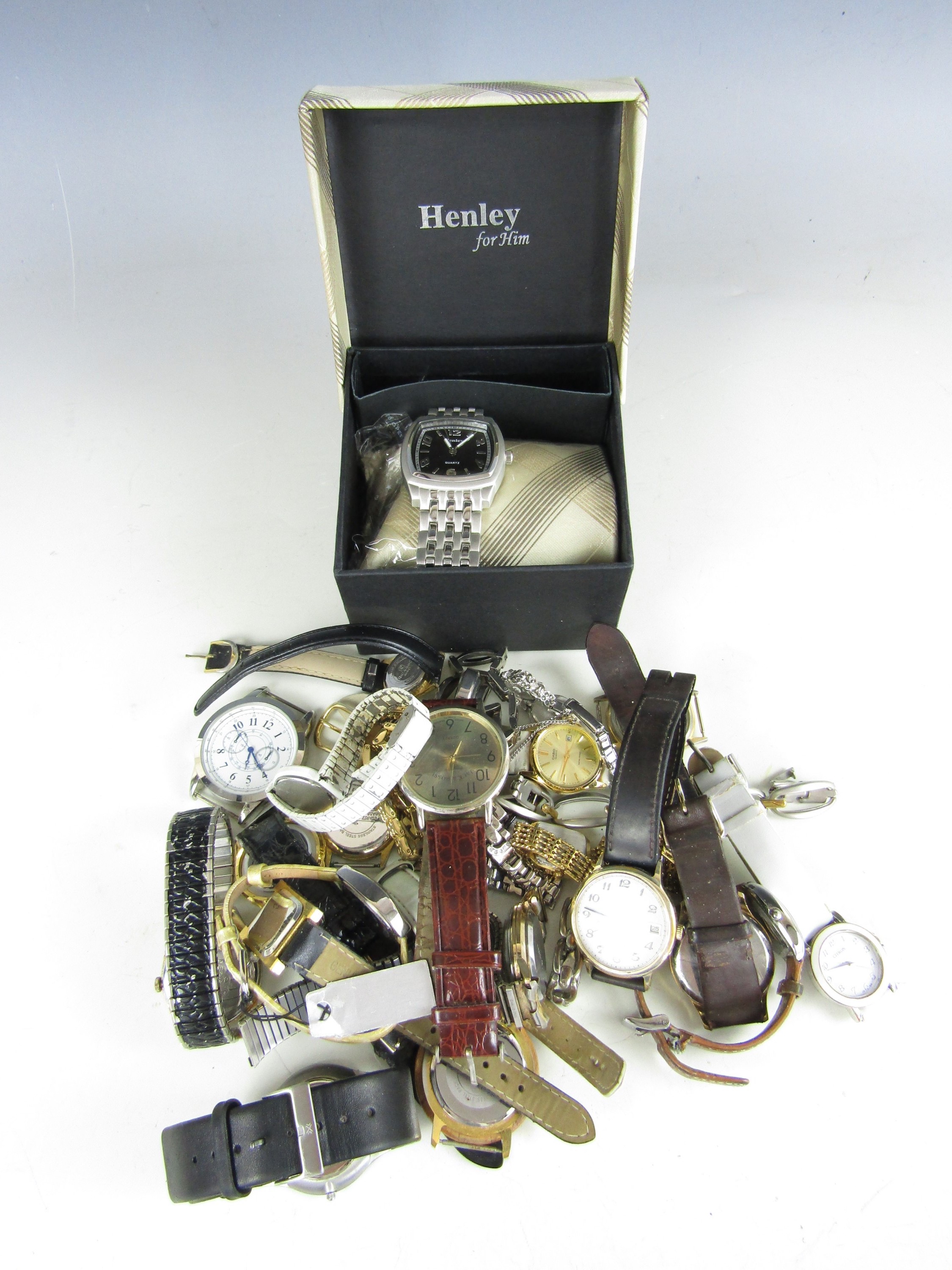 A large quantity of wrist watches including a boxed Henley watch and a Masonic watch etc