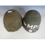 Two US M1 helmets