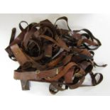 A large quantity of Sam Browne belts and straps