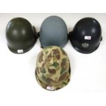 Four M1 type helmets