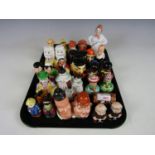 A large quantity of vintage novelty salt and pepper shakers including Laurel and Hardy, Humpty