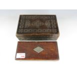 A Victorian Gothic chip carved wooden box together with one other