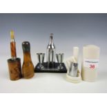 Sundry kitsch collectibles including an Art Deco novelty table cigar lighter modelled as a bottle