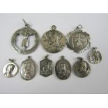 Various silver religious pendants