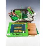 A quantity of vintage Subbuteo including a boxed stadium grand stand C140, scale teams and a mat