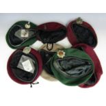 A quantity of post-War British maroon, green and SAS fawn berets