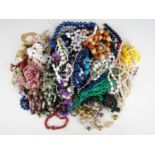 A large quantity of vintage costume jewellery necklaces