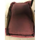 Two feather filled pillows in burgundy shot silk cases