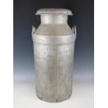 An aluminium milk churn