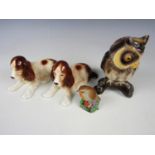 A pair of Sylvac spaniels together with a Jema owl and Worcester robin figurine