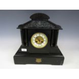 A Victorian black slate mantel clock in architectural case with presentation plaque