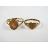 A 9ct gold and carved shell cameo dress ring, together with one other 9ct gold signet ring with an