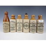 Six stoneware bottles including Armstrong & Dickie of Dumfries etc