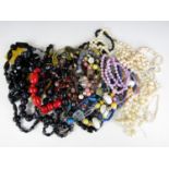 A large quantity of vintage costume jewellery necklaces