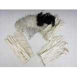 Late 19th / early 20th Century costume accessories, including an ostrich feather fan, three pairs of