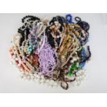 A large quantity of vintage costume jewellery necklaces