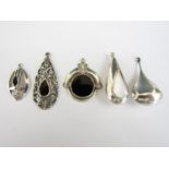 Five contemporary white metal pendants, two of teardrop form, one set with mother of pearl, together