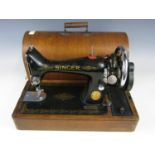 A late 19th / early 20th Century Singer hand operated sewing machine