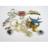 Sundry vintage costume jewellery including a white metal basse-taille enamelled and marcasite brooch