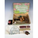 An early 20th Century wooden 'Buchanan's Assorted Chocolates' box together with sundry collectors'