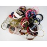 A large quantity of vintage costume jewellery bracelets