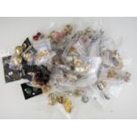 A large quantity of vintage and modern costume jewellery earrings, some unworn with original