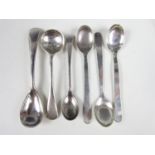 Three silver salt cruet spoons together with three other white metal spoons