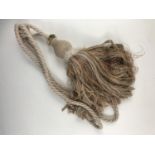 Four 'Natural' curtain tie-backs with tassels, unused and boxed