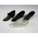 Four vintage moulded glass shoes