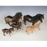 Three Beswick horses and ponies together with a Beswick donkey