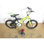 A child's bicycle and stabilizers
