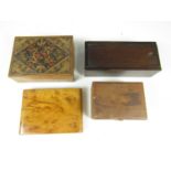 An early 20th Century bird's eye maple cigarette case together with three further boxes, including a