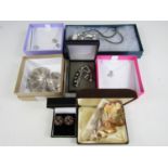 Modern costume jewellery in presentation boxes, including a Carrick of Scotland copper leaf brooch