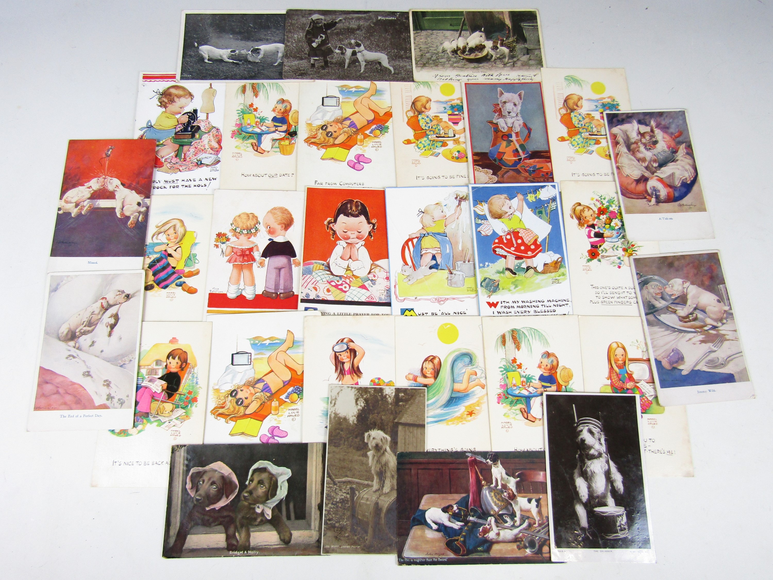 A quantity of vintage Mable Lucie Attwell postcards together with Bonzo the Dog and other dog