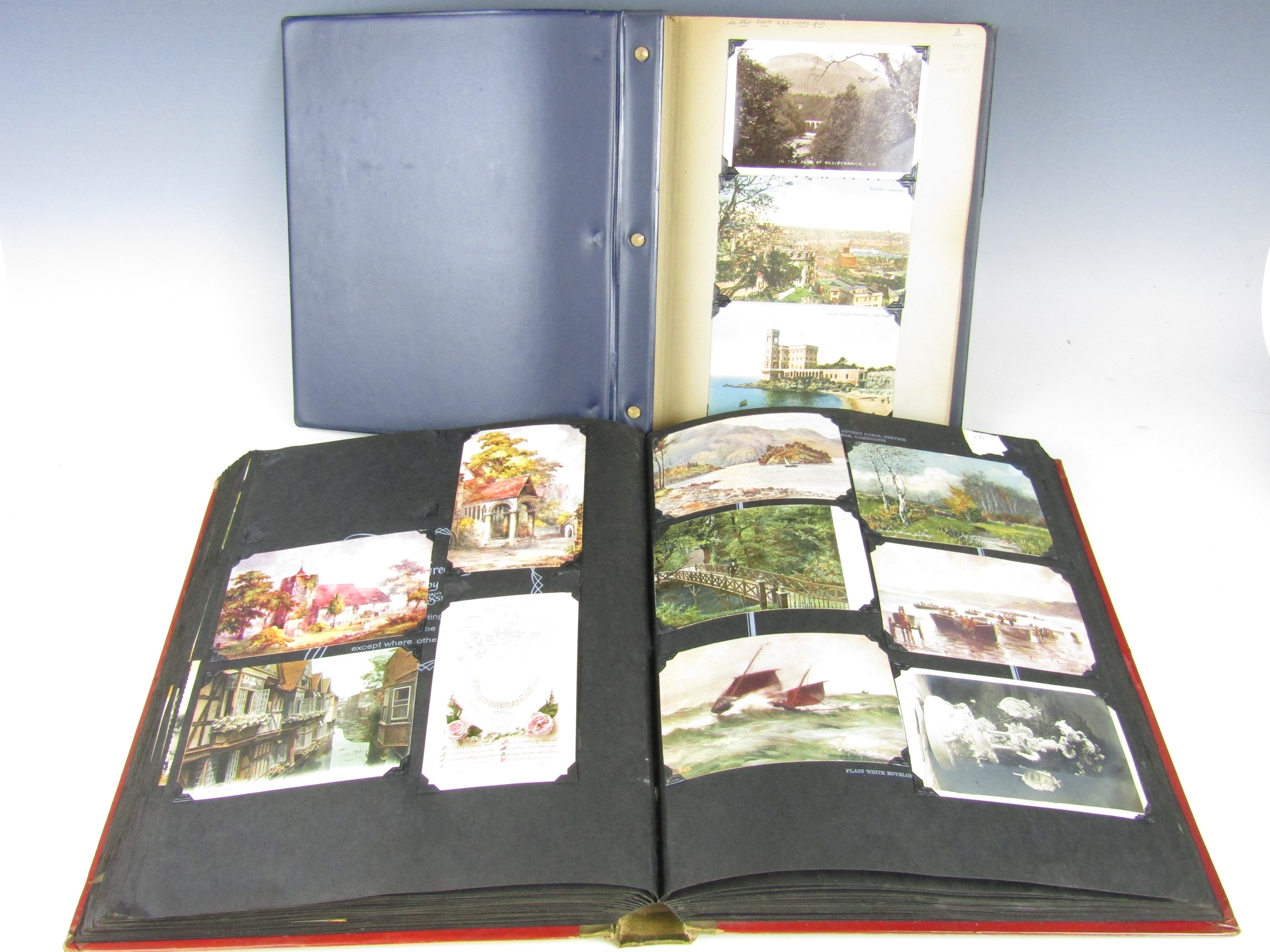 Two large albums of postcards