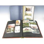 Two large albums of postcards