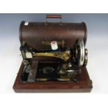 A late 19th / early 20th Century Singer hand operated sewing machine